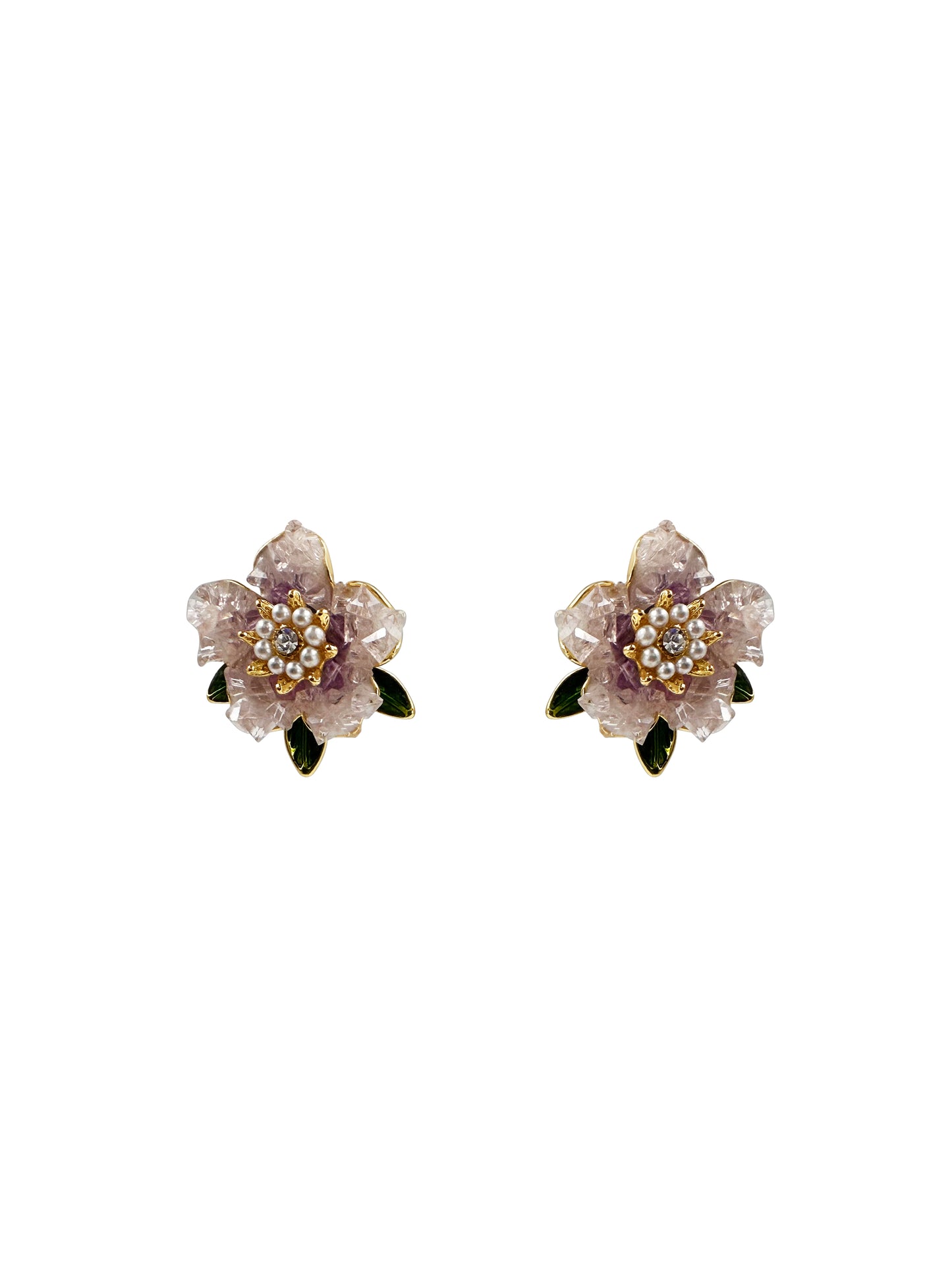 Pair of floral earrings with purple flowers and green leaves on a white background