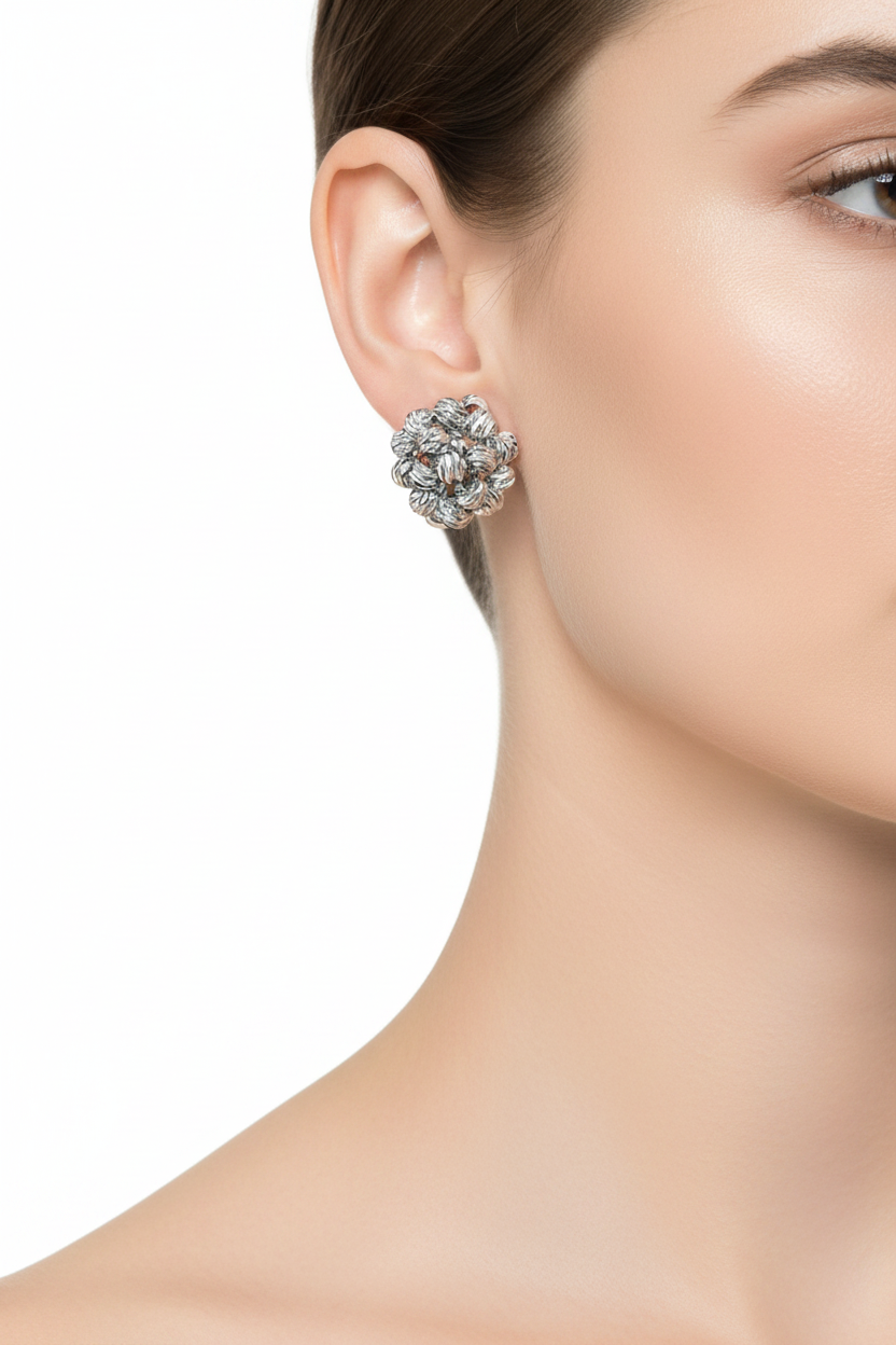 Model wearing Grooved Cluster Studs in Silver