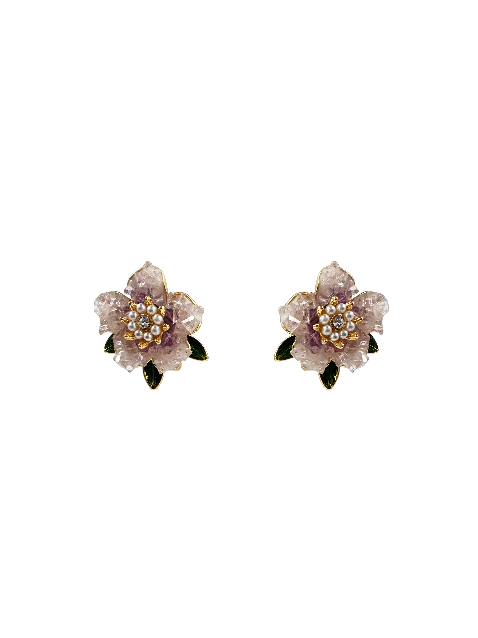 Pair of floral earrings with purple flowers and green leaves on a white background