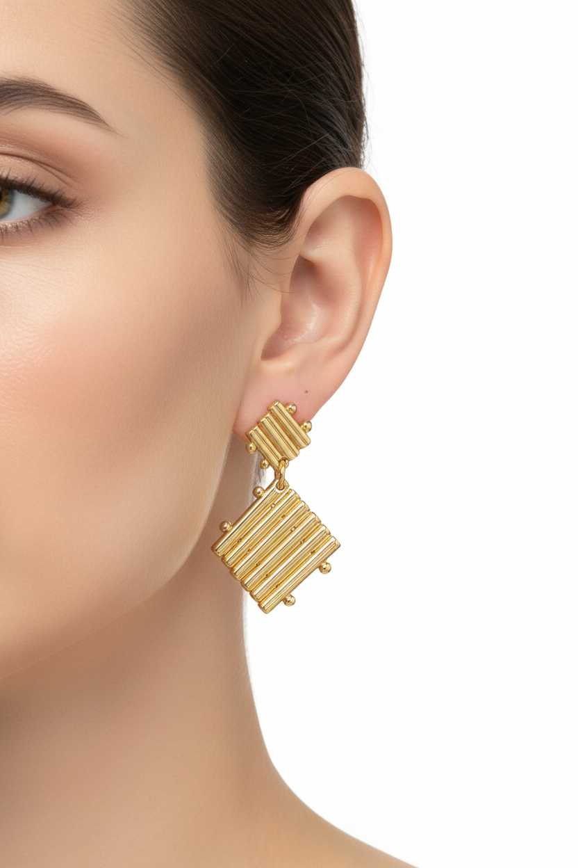 Gold Ribbed Diamond Drop Earrings - model wearing earrings