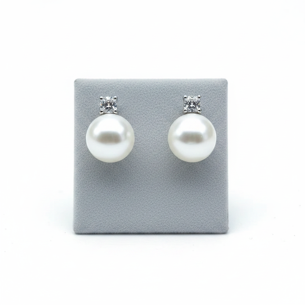 Pearl Earrings on Grey Stand