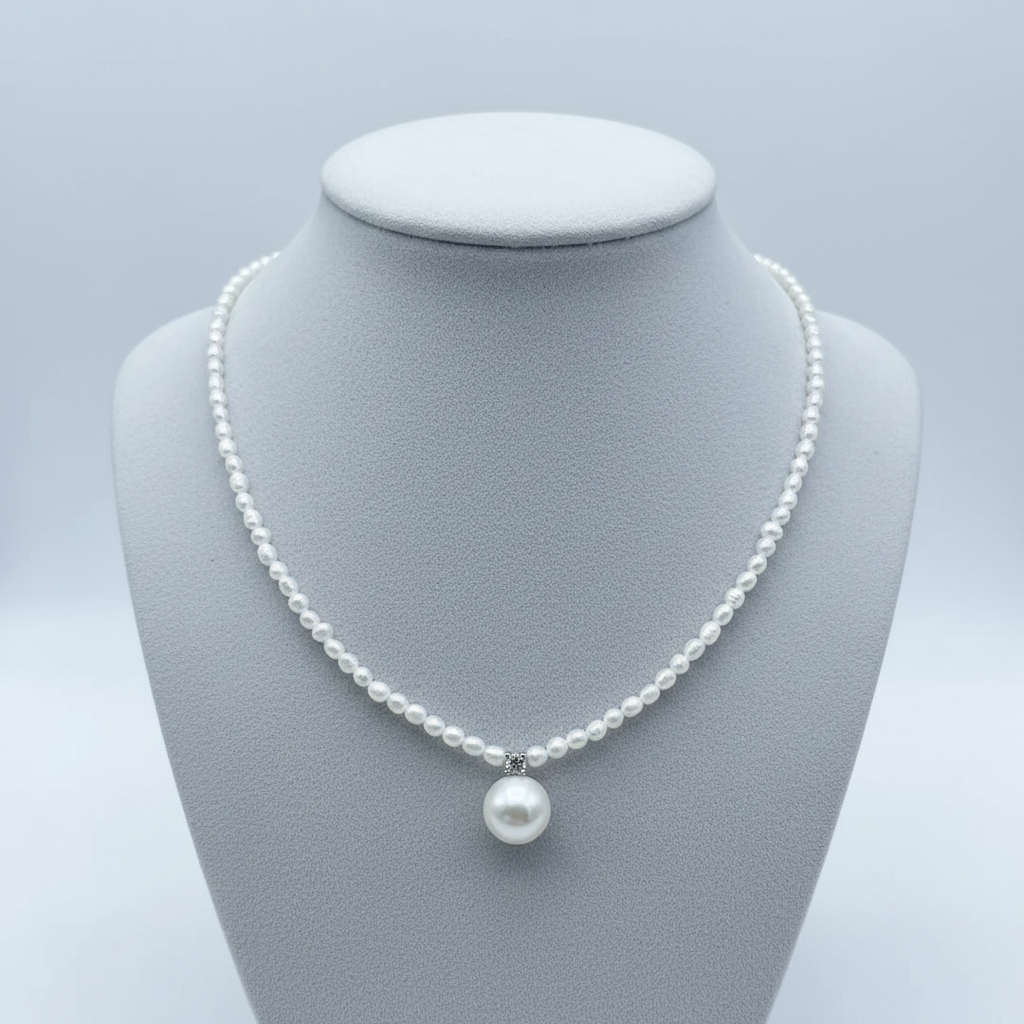 Pearl Necklace on Grey Bust